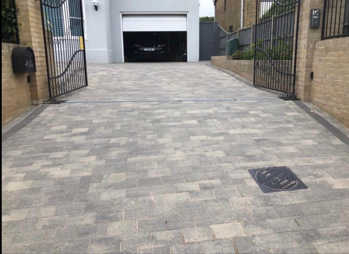 Block paving driveway with entrance gates